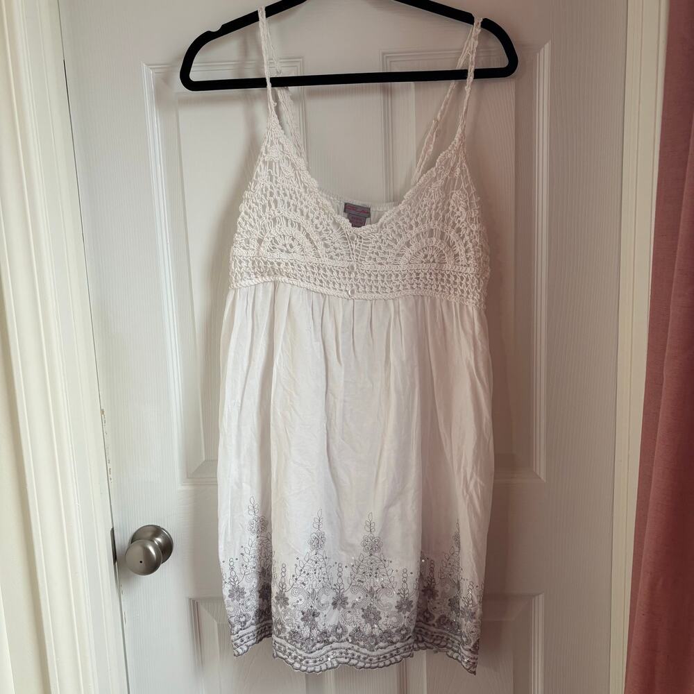 White crochet mini dress with with bedazzled designs